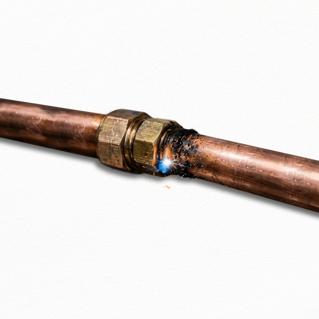 Close-up of a spark and arc at a copper pipe compression fitting joint.